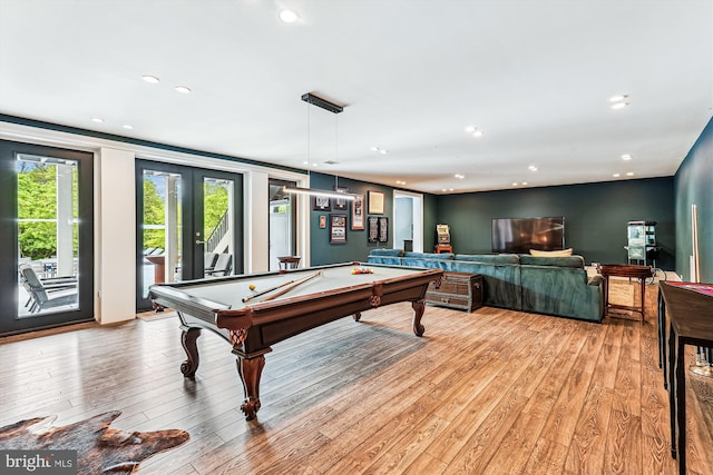 recreation room featuring pool table, light wood finished floors, recessed lighting, and french doors
