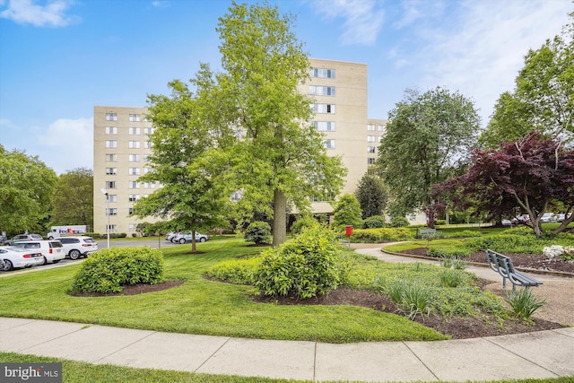 surrounding community with a lawn