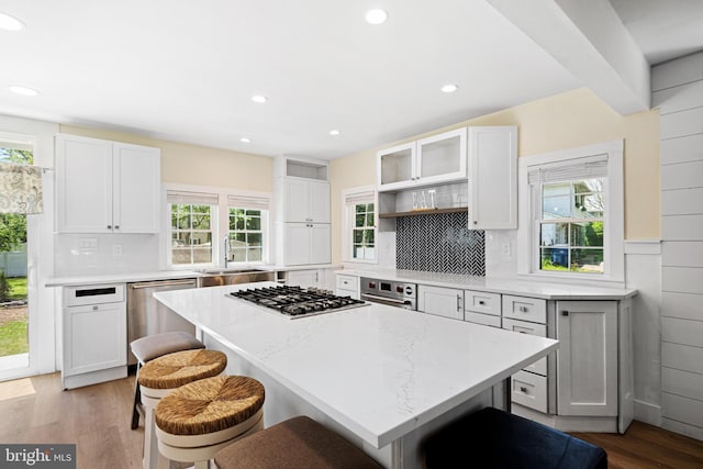 5 Winding Brook Dr, Cinnaminson, NJ 08077 - kitchen with a sink, open shelves, a kitchen breakfast bar, appliances with stainless steel finishes, and plenty of natural light