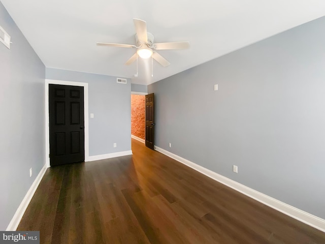 2010 Rowan St, Philadelphia, PA 19140 - unfurnished room with ceiling fan, dark wood-type flooring, and baseboards
