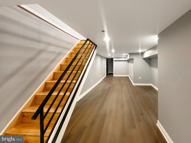 2010 Rowan St, Philadelphia, PA 19140 - finished basement featuring baseboards, wood finished floors, stairway, and recessed lighting
