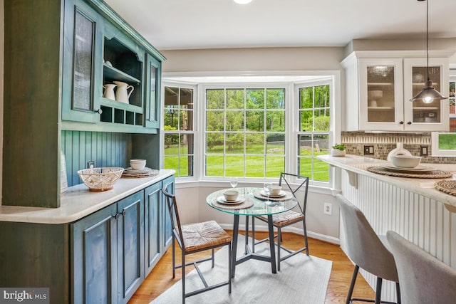 sunroom / solarium with french doors and healthy amount of natural light