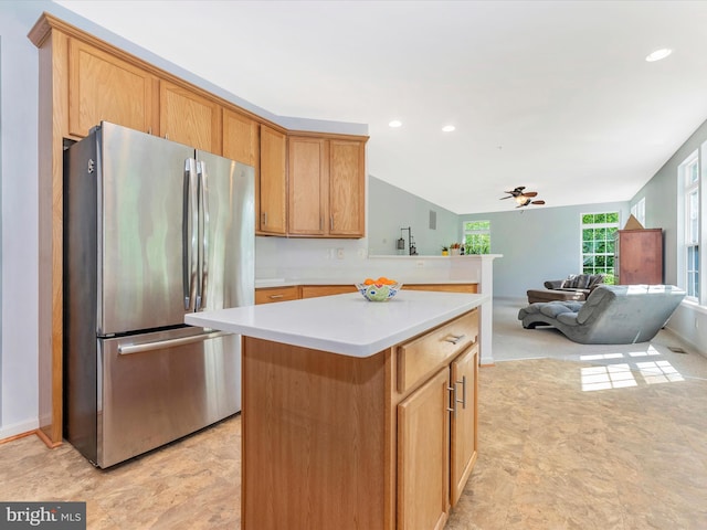 9731 Wyndham Dr, Frederick, MD 21704 - kitchen with freestanding refrigerator, light countertops, ceiling fan, a kitchen island, and recessed lighting