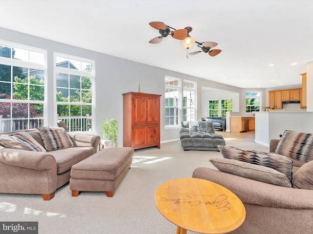 9731 Wyndham Dr, Frederick, MD 21704 - living area featuring light carpet, recessed lighting, ceiling fan, and baseboards