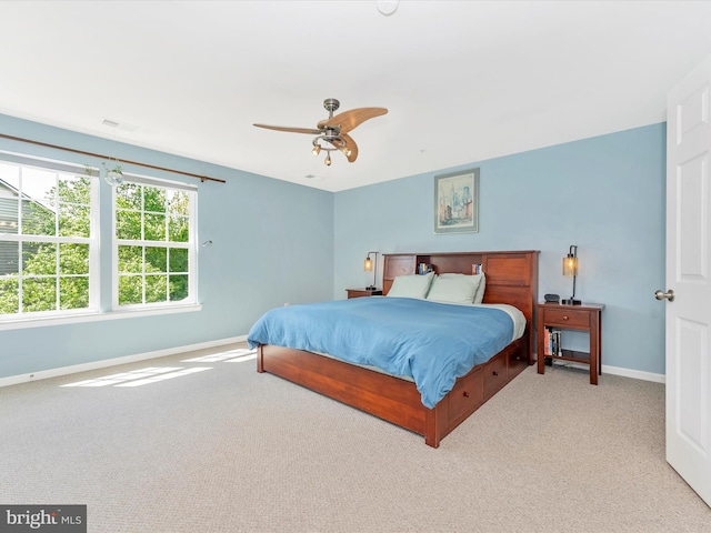 9731 Wyndham Dr, Frederick, MD 21704 - carpeted bedroom with baseboards and a ceiling fan
