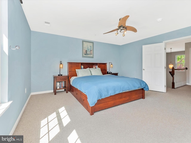 9731 Wyndham Dr, Frederick, MD 21704 - carpeted bedroom featuring baseboards and ceiling fan
