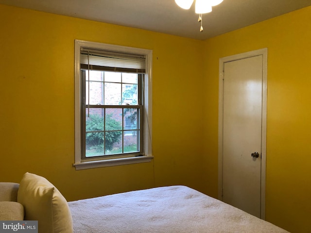 bedroom featuring multiple windows