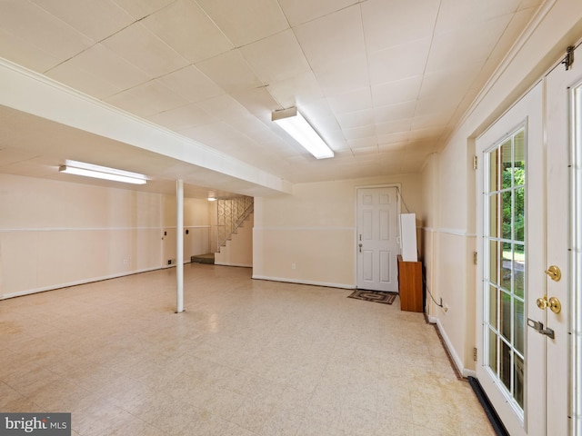 5403 Rolling Rd, Springfield, VA 22151 - basement with stairs, tile patterned floors, and baseboards