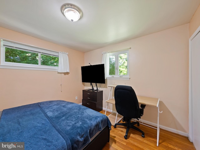 5403 Rolling Rd, Springfield, VA 22151 - bedroom featuring multiple windows, wood finished floors, and baseboards
