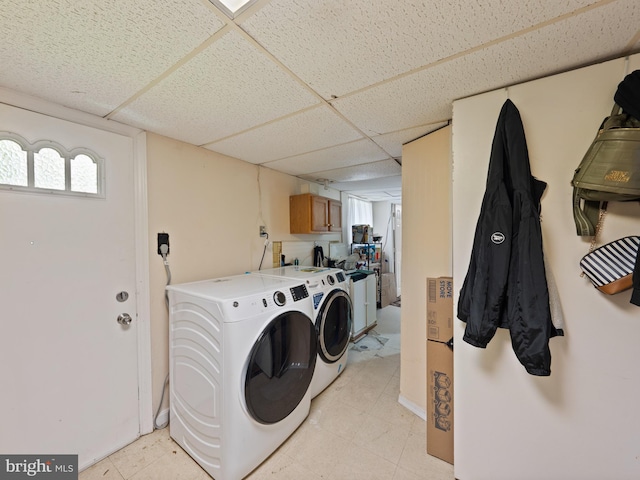 5403 Rolling Rd, Springfield, VA 22151 - laundry room featuring washing machine and clothes dryer and cabinet space