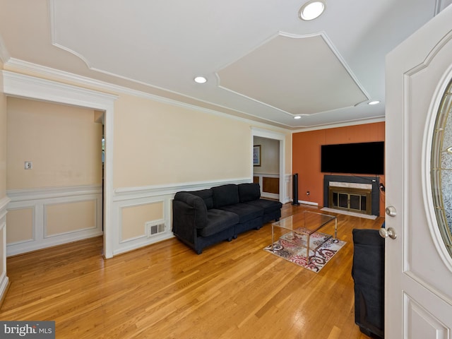 5403 Rolling Rd, Springfield, VA 22151 - living room with a wainscoted wall, light wood finished floors, ornamental molding, and recessed lighting