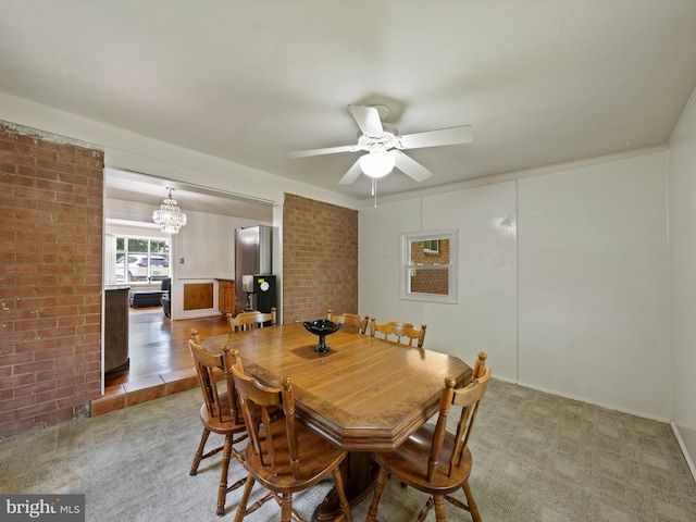 5403 Rolling Rd, Springfield, VA 22151 - carpeted dining room with a ceiling fan and a chandelier