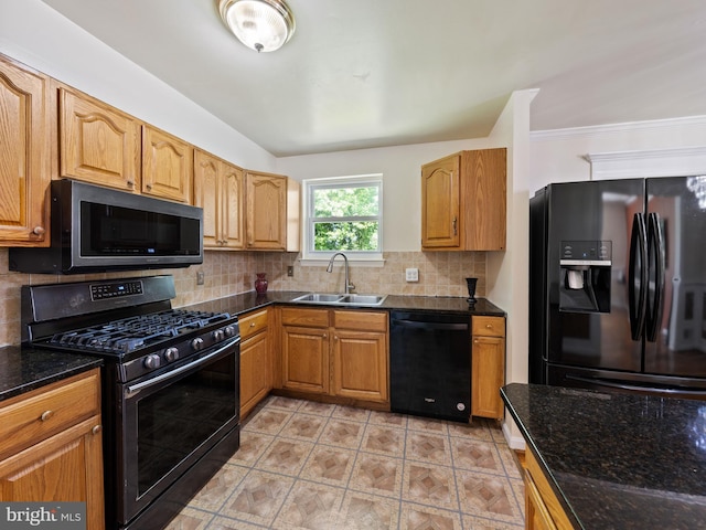 5403 Rolling Rd, Springfield, VA 22151 - kitchen featuring black appliances, a sink, tasteful backsplash, dark stone counters, and ornamental molding