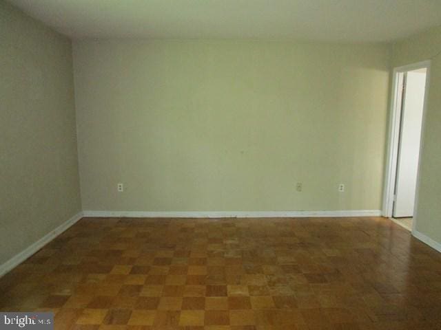 718 Quince Orchard Blvd Unit 718, Gaithersburg, MD 20878 - empty room featuring baseboards