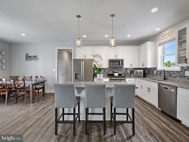 16016 Ambleside Ct, Hughesville, MD 20637 - kitchen featuring stainless steel appliances, decorative backsplash, dark wood-style floors, a sink, and recessed lighting