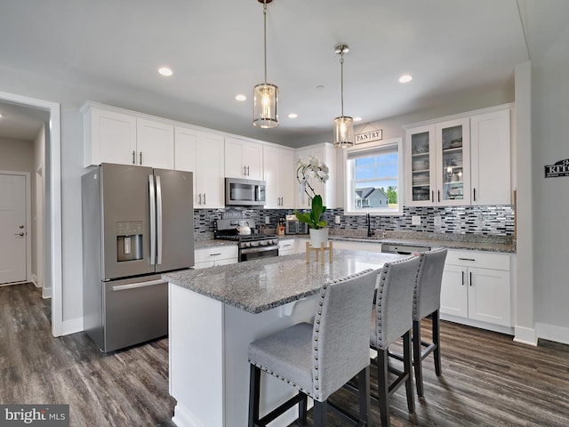 16016 Ambleside Ct, Hughesville, MD 20637 - kitchen featuring appliances with stainless steel finishes, white cabinetry, backsplash, and recessed lighting