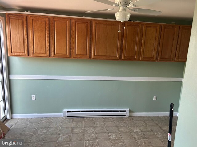 12 Emmit Ct, Emmitsburg, MD 21727 - kitchen with a baseboard radiator, a ceiling fan, brown cabinets, and baseboards