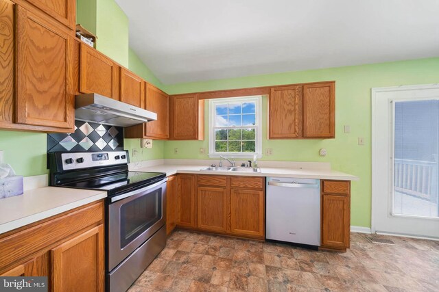 115 Emmitsburg Rd, Thurmont, MD 21788 - kitchen with stainless steel appliances, under cabinet range hood, a sink, stone finish floors, and light countertops