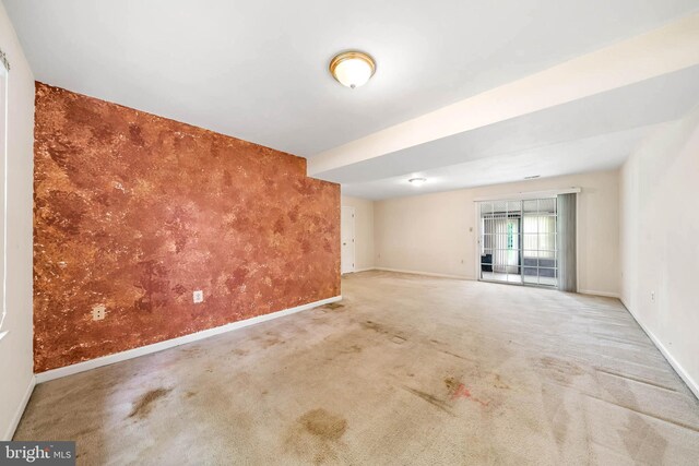 115 Emmitsburg Rd, Thurmont, MD 21788 - carpeted empty room featuring baseboards and an accent wall