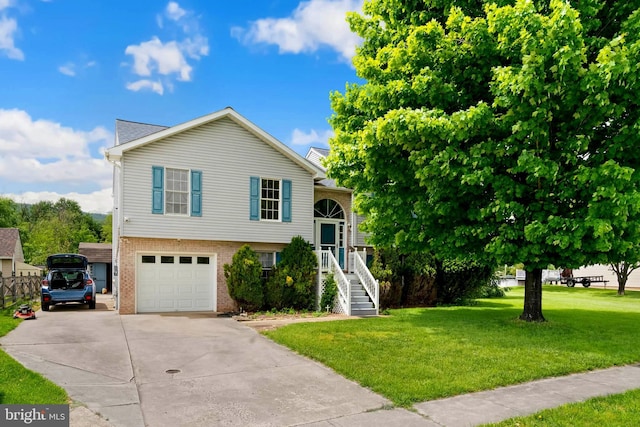 115 Emmitsburg Rd, Thurmont, MD 21788 - view of front of house featuring driveway, brick siding, a front yard, and a garage