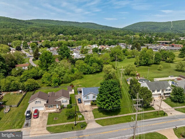 115 Emmitsburg Rd, Thurmont, MD 21788 - aerial perspective of suburban area featuring a heavily wooded area and a mountainous background