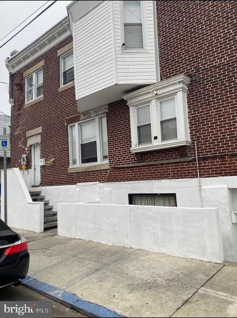 4400 N Franklin St, Philadelphia, PA 19140 - view of side of home featuring brick siding