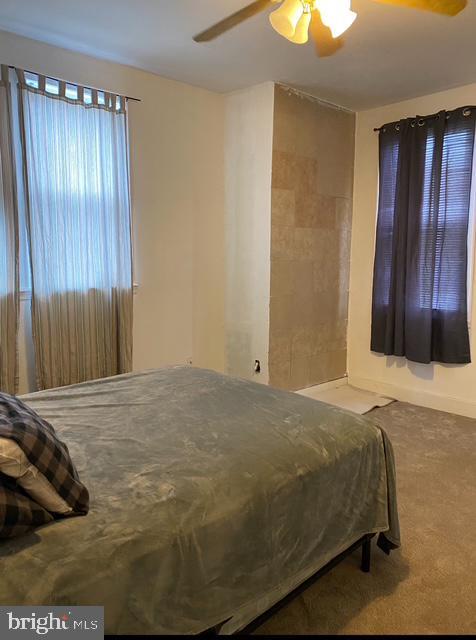 4400 N Franklin St, Philadelphia, PA 19140 - carpeted bedroom featuring a ceiling fan