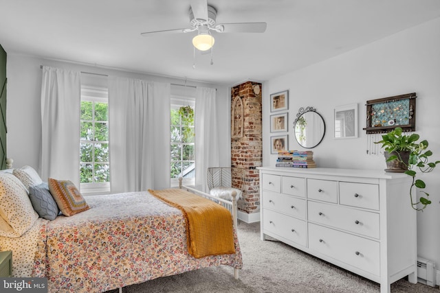 155 E Louther St, Carlisle, PA 17013 - bedroom with a baseboard heating unit, light carpet, and ceiling fan