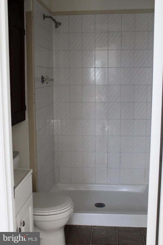 8323 Revelation Ave, Walkersville, MD 21793 - bathroom featuring tile patterned floors, a stall shower, toilet, and vanity
