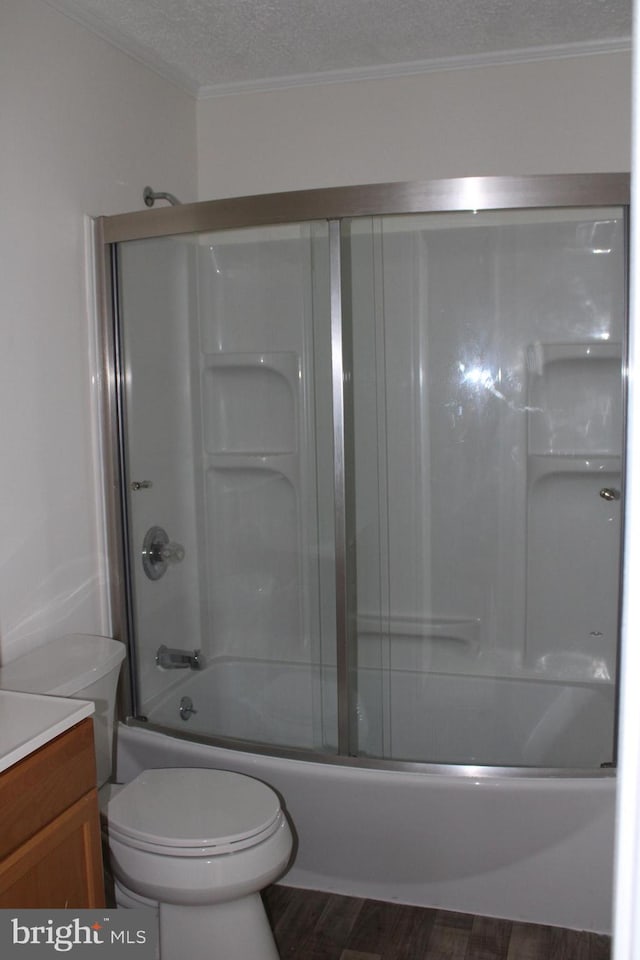 8323 Revelation Ave, Walkersville, MD 21793 - bathroom with a textured ceiling, toilet, wood finished floors, combined bath / shower with glass door, and vanity