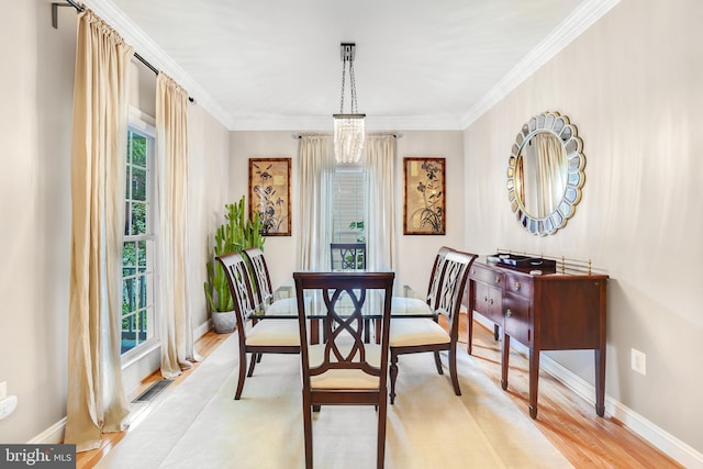 147 Little Quarry Rd, Gaithersburg, MD 20878 - dining space with light wood-type flooring, crown molding, baseboards, and a chandelier