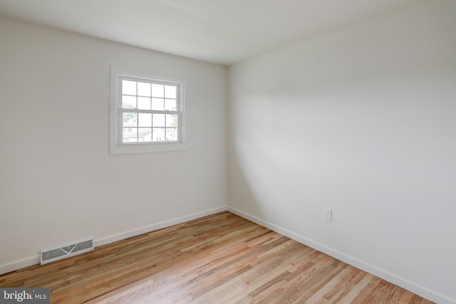 809 N Arch St, Mechanicsburg, PA 17055 - spare room with baseboards and light wood-style flooring
