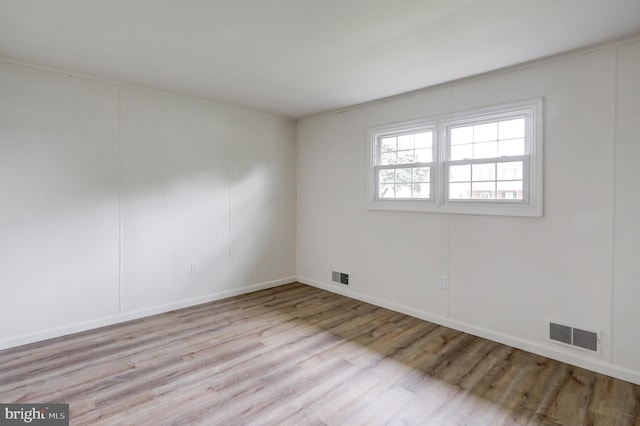 809 N Arch St, Mechanicsburg, PA 17055 - empty room with wood finished floors and baseboards