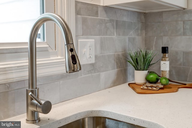 809 N Arch St, Mechanicsburg, PA 17055 - kitchen view of backsplash, light countertops, and a sink