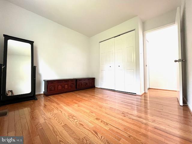 5044 Head Ct, Fairfax, VA 22032 - unfurnished bedroom with wood finished floors and a closet