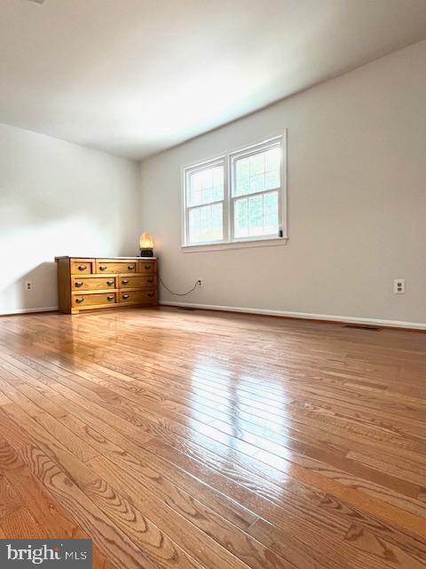 5044 Head Ct, Fairfax, VA 22032 - unfurnished room featuring wood-type flooring and baseboards