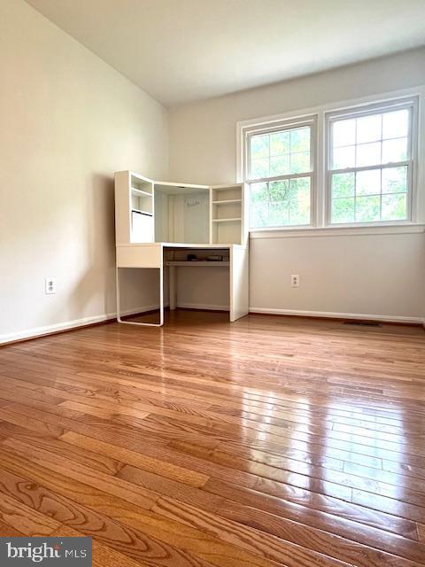 5044 Head Ct, Fairfax, VA 22032 - unfurnished bedroom with wood-type flooring and baseboards