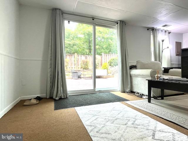 5044 Head Ct, Fairfax, VA 22032 - living room featuring carpet flooring and a decorative wall