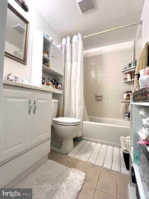 5044 Head Ct, Fairfax, VA 22032 - full bathroom featuring tile patterned flooring, vanity, toilet, and shower / tub combo