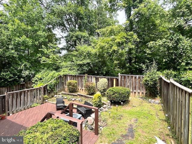 5044 Head Ct, Fairfax, VA 22032 - fenced backyard with a wooden deck