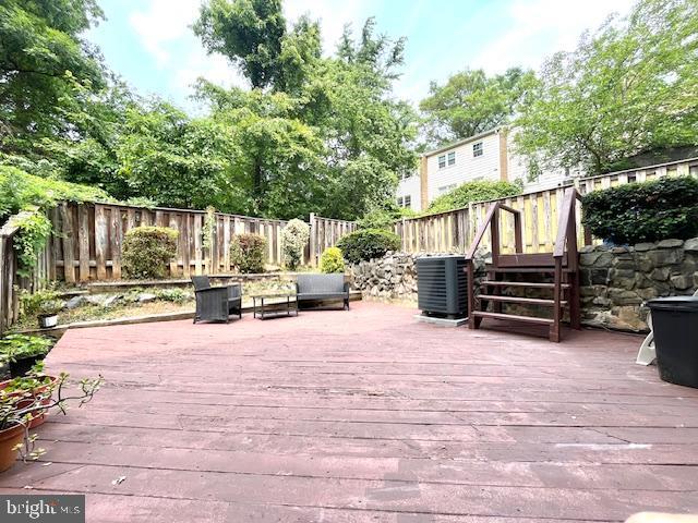5044 Head Ct, Fairfax, VA 22032 - wooden deck with central AC and a fenced backyard