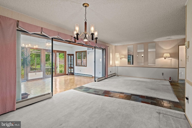 20 Hollow Rd, Levittown, PA 19056 - interior space with baseboard heating, a chandelier, a textured ceiling, and carpet