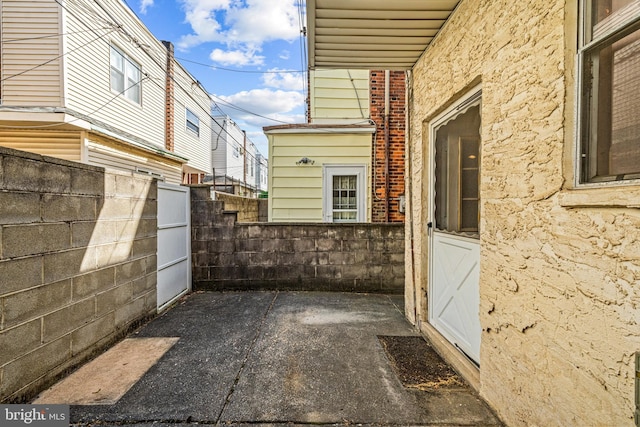 view of side of property with fence