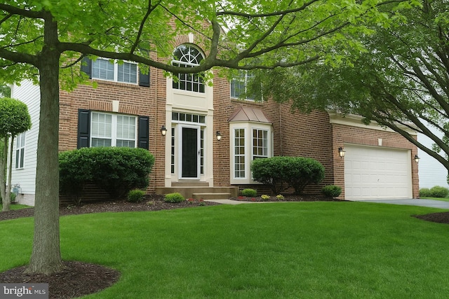 32 Beau Ridge Dr, Stafford, VA 22556 - view of front of property featuring a front lawn and brick siding