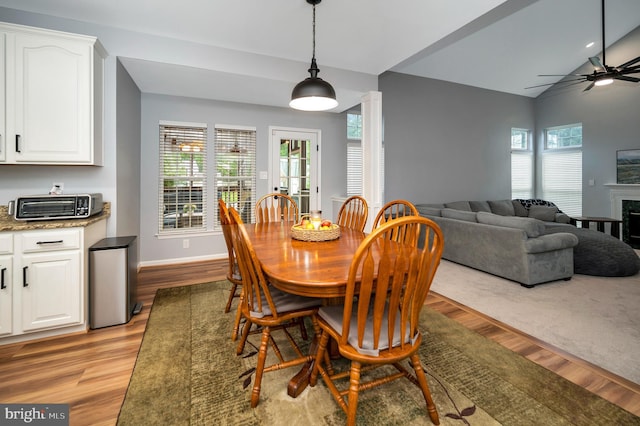 32 Beau Ridge Dr, Stafford, VA 22556 - dining area featuring plenty of natural light, light wood-type flooring, a ceiling fan, lofted ceiling, and baseboards