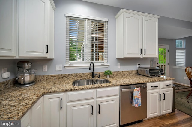 32 Beau Ridge Dr, Stafford, VA 22556 - kitchen featuring dishwasher, a sink, white cabinetry, and wood finished floors