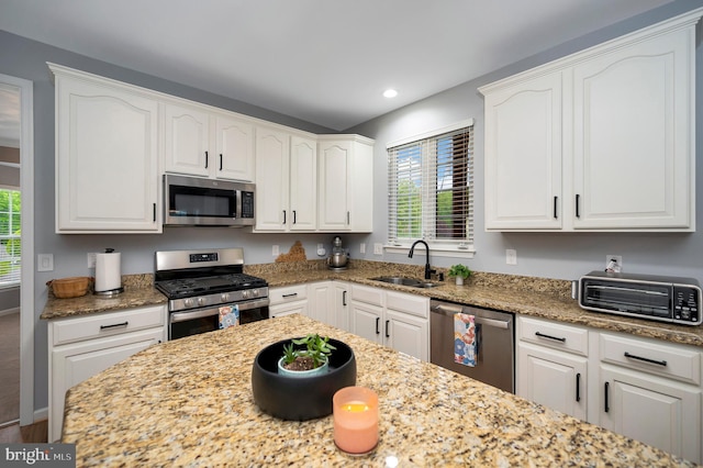 32 Beau Ridge Dr, Stafford, VA 22556 - kitchen featuring stainless steel appliances, a sink, white cabinets, light stone countertops, and recessed lighting