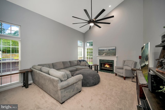 32 Beau Ridge Dr, Stafford, VA 22556 - carpeted living room featuring high vaulted ceiling, plenty of natural light, a premium fireplace, ceiling fan, and recessed lighting
