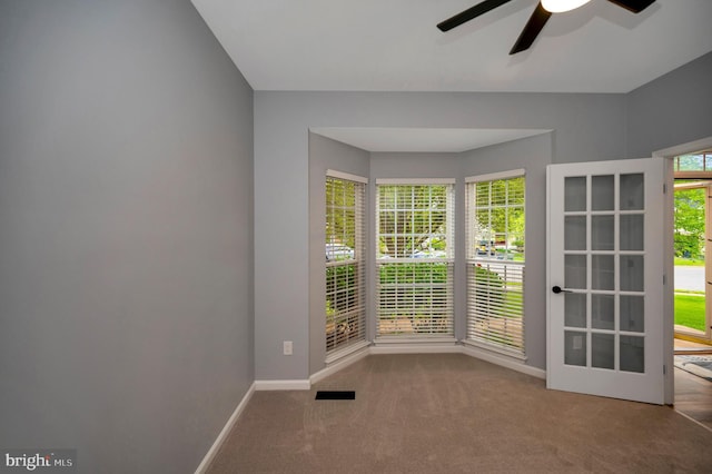 32 Beau Ridge Dr, Stafford, VA 22556 - doorway to outside with carpet, a ceiling fan, and baseboards