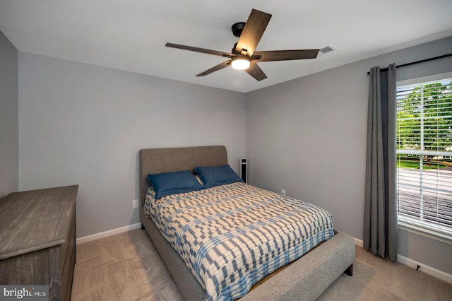 32 Beau Ridge Dr, Stafford, VA 22556 - bedroom featuring light carpet, baseboards, and a ceiling fan